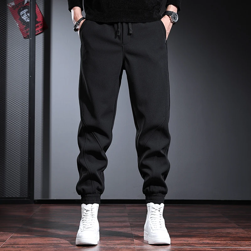 高端男士休闲裤潮流宽松阔腿束脚裤春秋季简约大码黑色运动卫裤