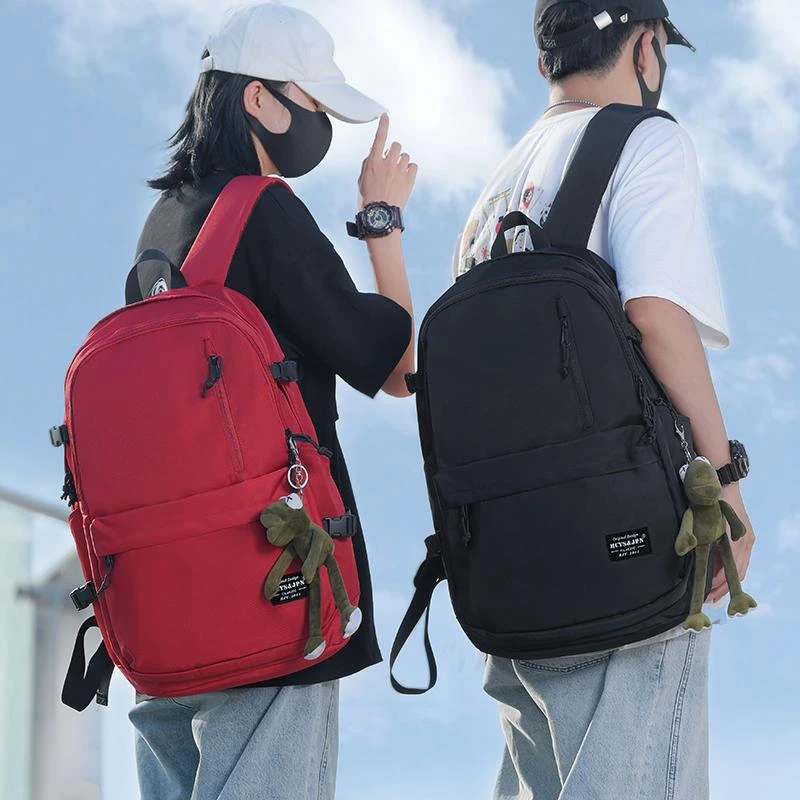 新款双肩包男士电脑包背包女大容量登山旅游旅行包初中高中大学生