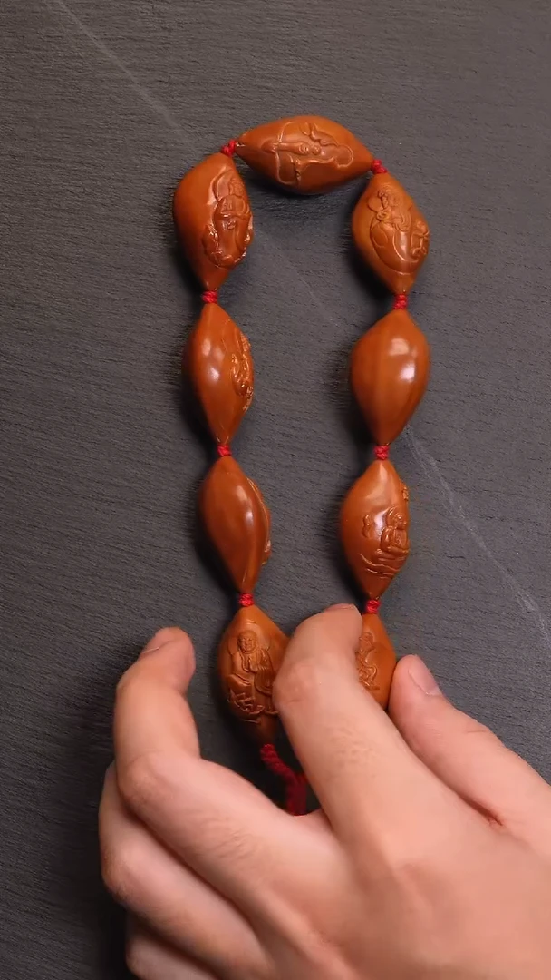 【闪购商品】橄榄核核雕16万佛手持光背8