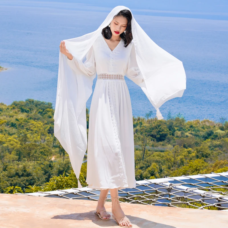 宽松连衣裙女夏V领仙气飘逸海边度假显瘦白色蕾丝百搭雪纺连衣裙