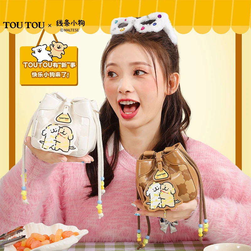 toutou2023新款线条小狗正版贴贴包饼干水桶包单肩斜挎包40631