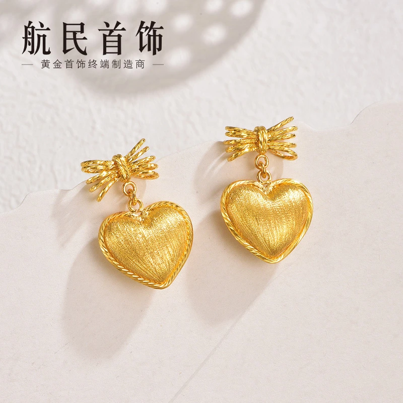 航民首饰 臻心黄金耳钉5G爱心蝴蝶结耳饰女XYJ1591工费330元/件