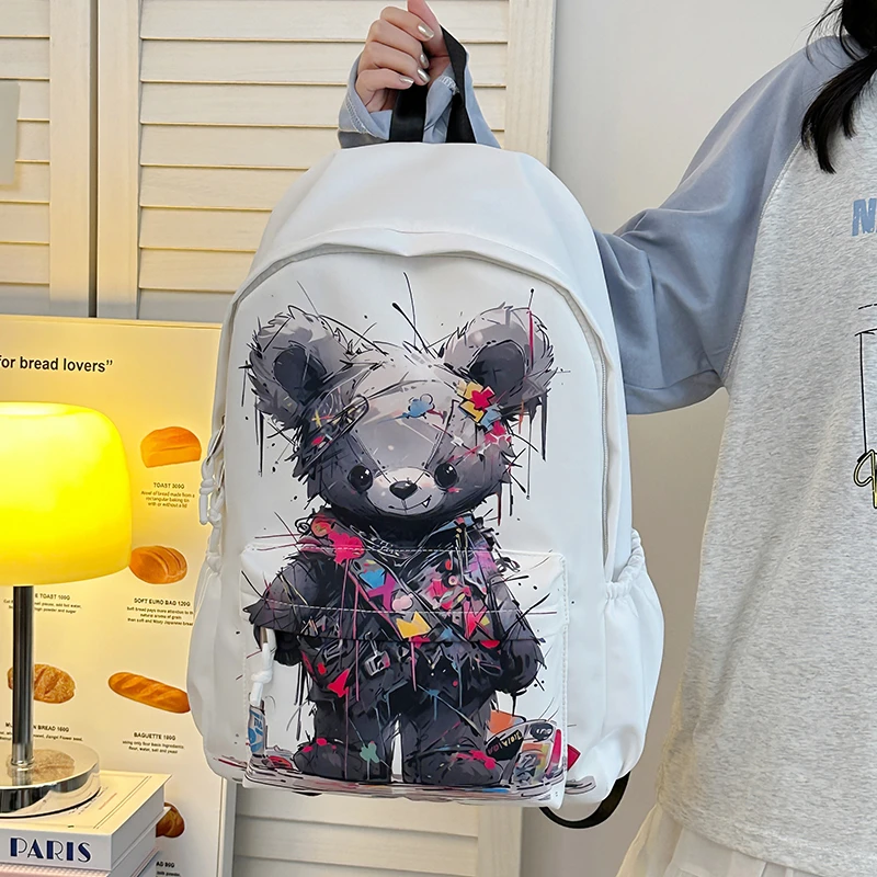 小熊涂鸦日系大容量百搭轻便潮流耐用双肩包学院风小众漫画书包