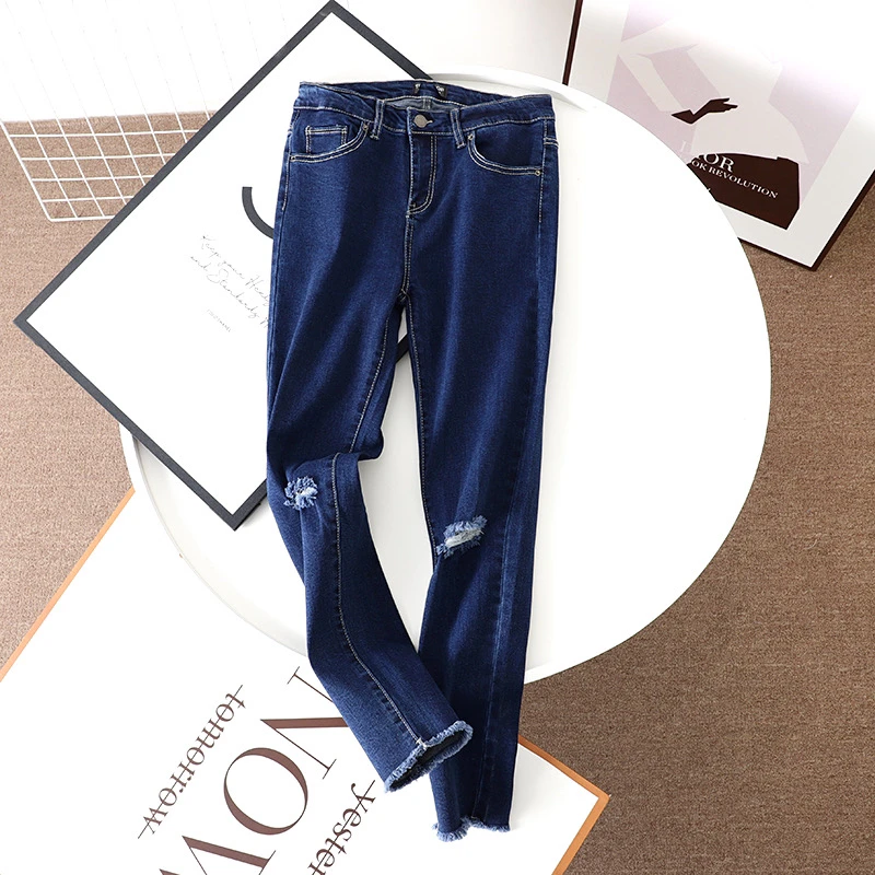 SU240 西班牙D复古舒适时尚破洞修身显瘦毛边时尚牛仔裤女