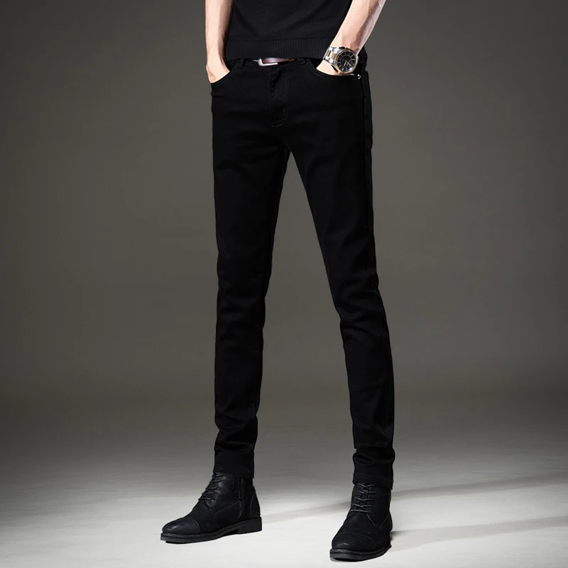 高端秋季纯黑色弹力牛仔裤男修身小脚潮牌韩版2024新款休闲裤子男
