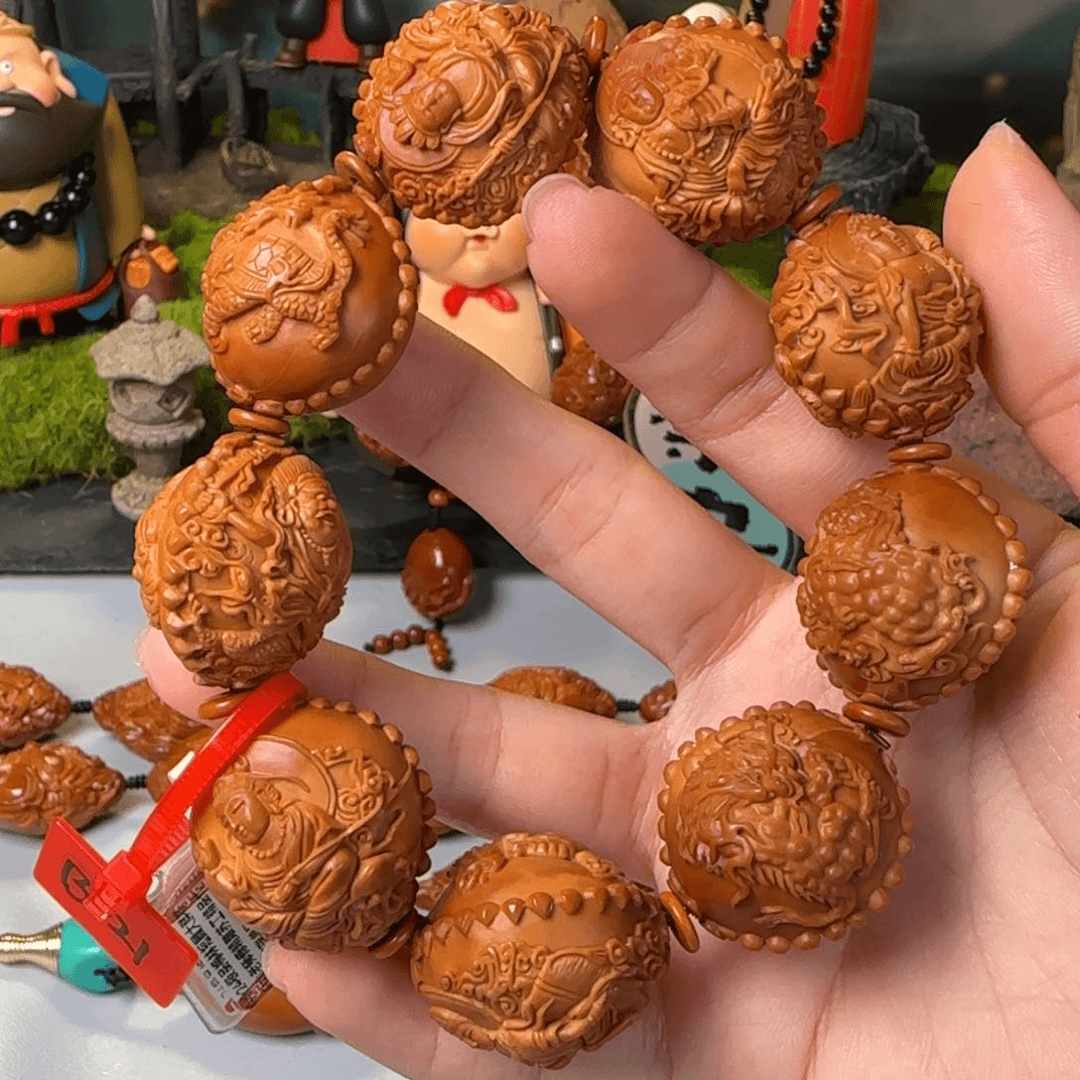 橄榄核核雕24尺寸瑞兽万佛