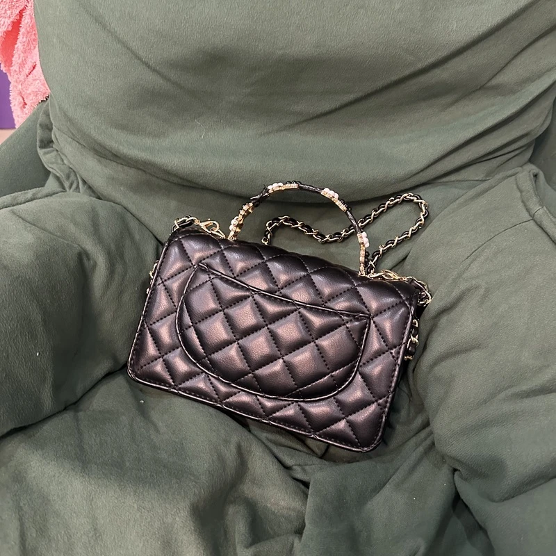 新款包包手提花花黑色