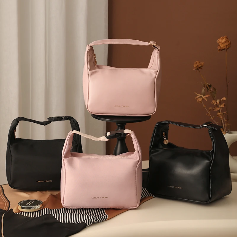 化妆包女2025新款高端便携式ins大容量洗漱包旅行手提袋