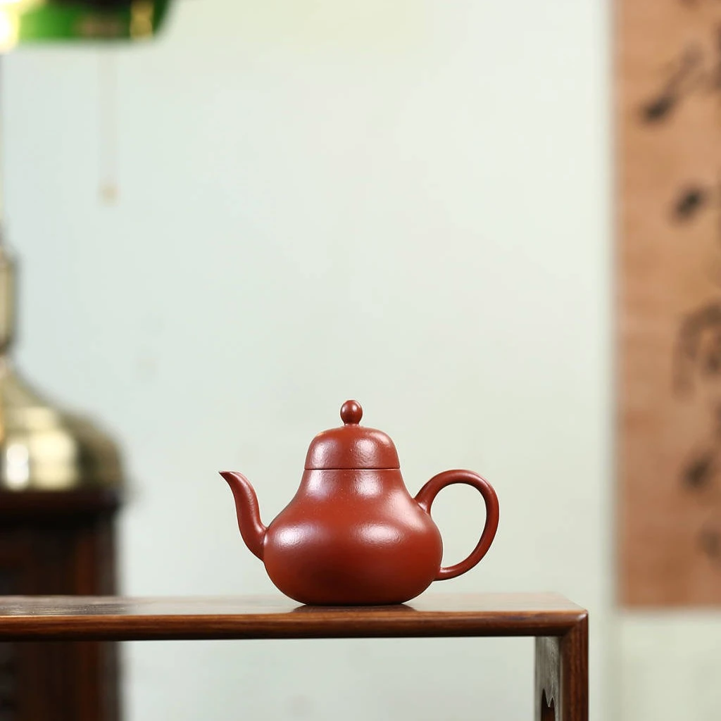 小思亭小煤窑朱泥130毫升思亭壶为清代陆思亭所创壶式，器形简洁