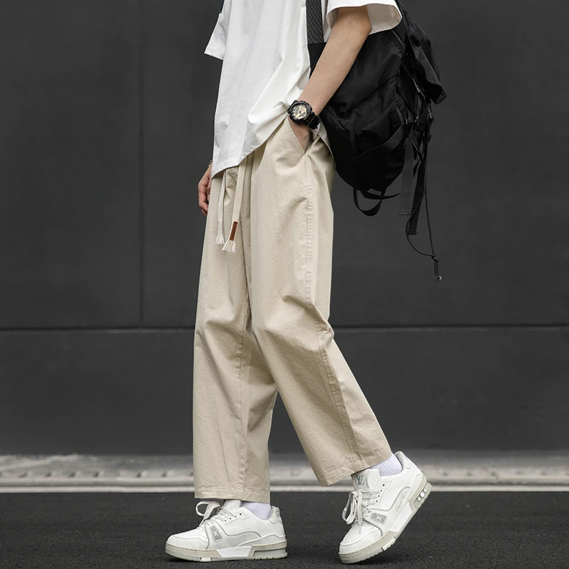卡其纯棉裤子男生夏季薄款潮牌宽松直筒阔腿男生纯色九分休闲长裤