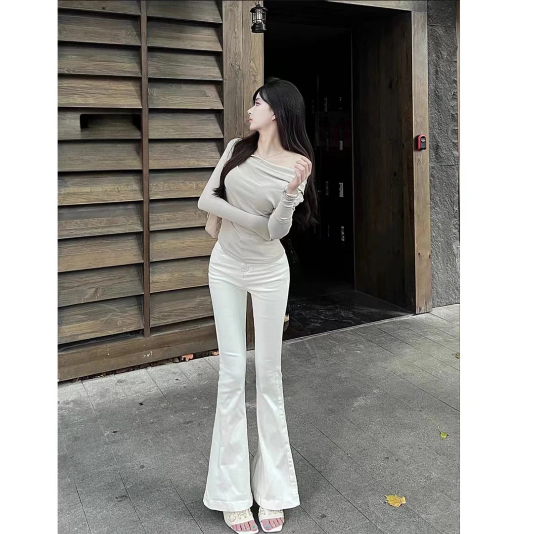 睿夕【美腿神裤】辣妹单扣修身显瘦牛仔裤喇叭裤