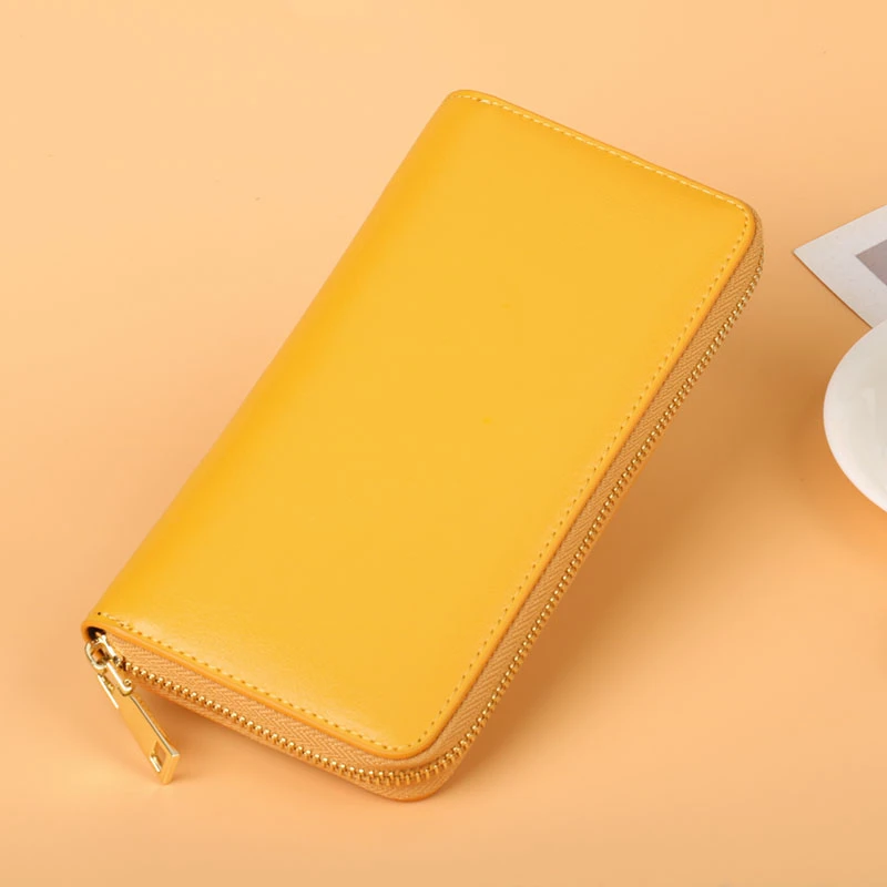 黄色真皮钱包2025新款女士牛皮长款钱包韩版潮流男女款情侣手拿包