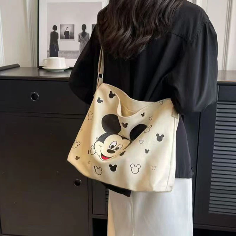 帆布包女斜挎包2024ins秋冬新款日系大容量卡通印花学生单肩布包