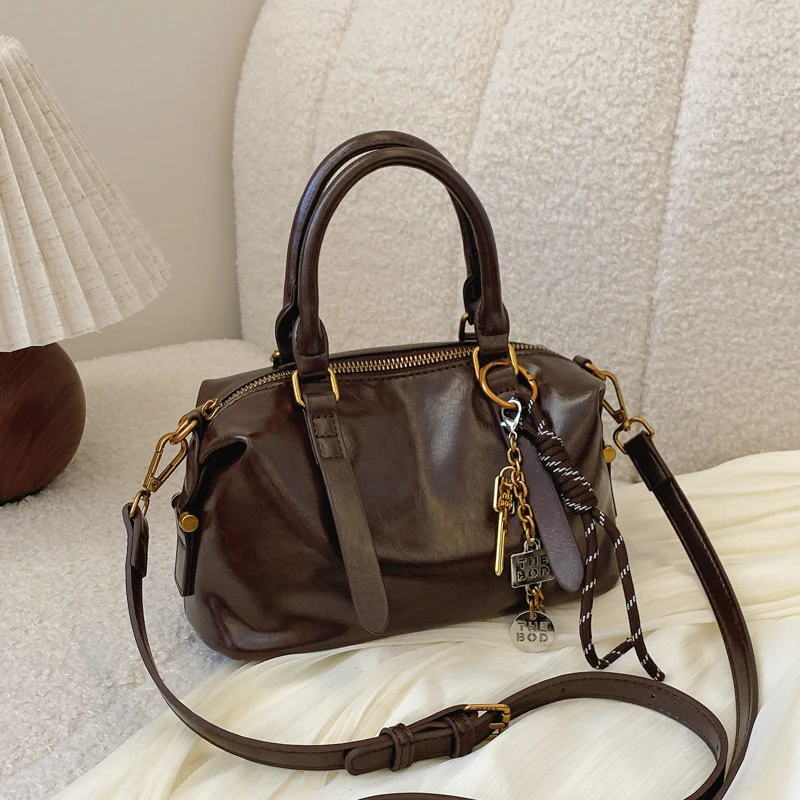 2024秋冬新款时尚百搭手提肩挎包菜篮子女包小众质感复古波士顿包