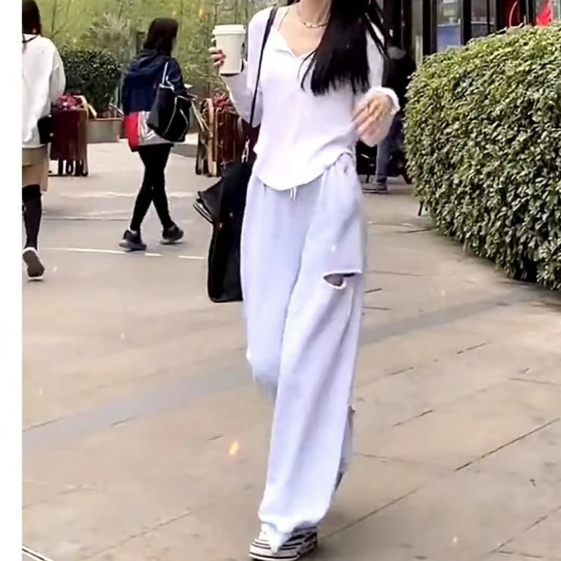 发货快新款百搭洋气简约显瘦气质打底上衣破洞休闲裤子女装TT0216