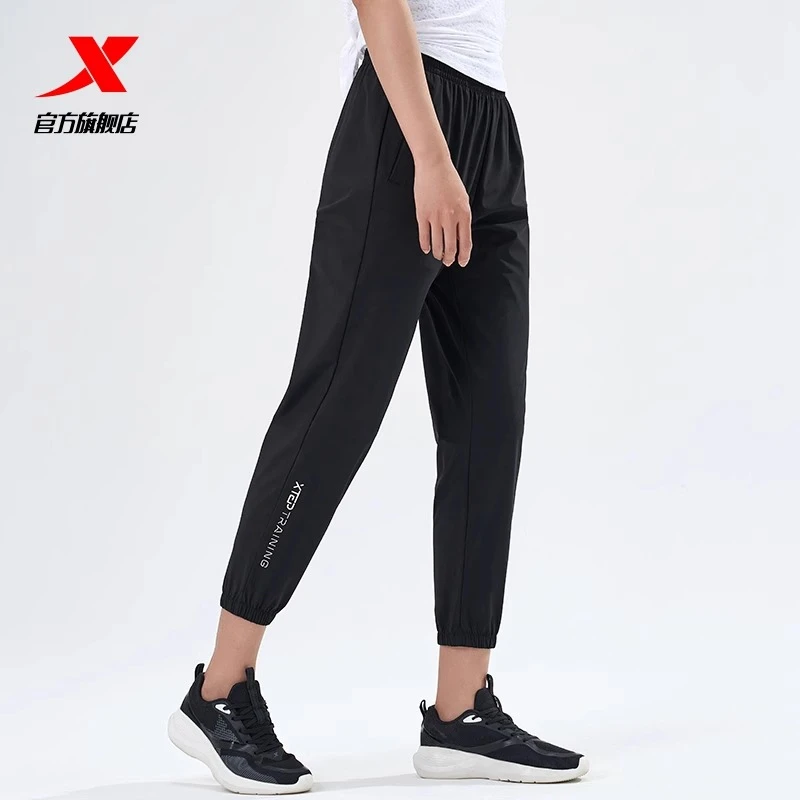 XTEP/特步梭织长裤女春秋新款薄款透气速干女子运动裤束脚休闲裤