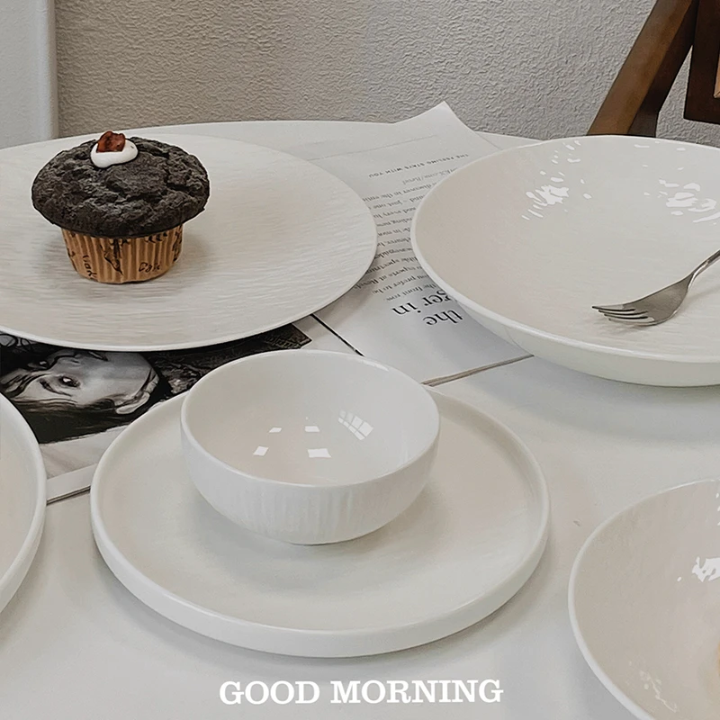 新疆包邮岩石纹高级日式创意轻奢餐具简约白色陶瓷碗盘家用碗碟