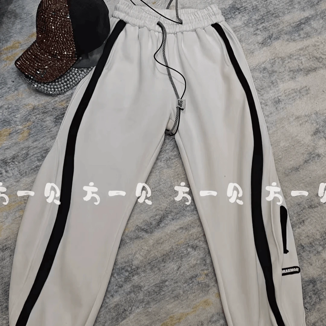2024新款白色运动裤子女束脚卫裤线条秋冬款宽松设计感小众裤子66
