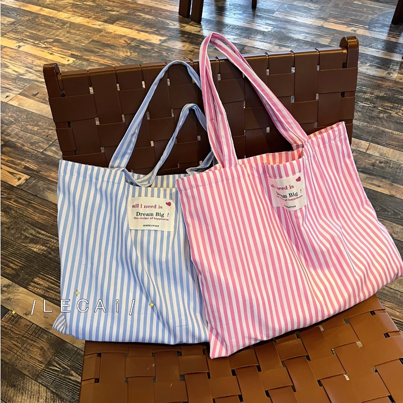 2024休闲原创时尚ins百搭简棉布大容量韩版腋下手提竖条纹单肩包