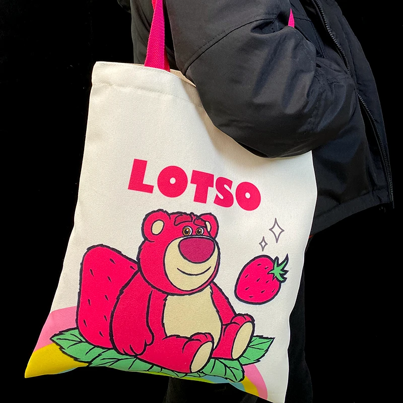 迪士尼单肩包女帆布包出行休闲百搭时尚简约印花卡通单肩学生潮流