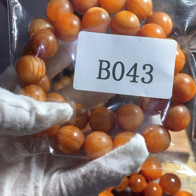 【闪购商品】血龙木核雕用****11.5手持043打三通穿好