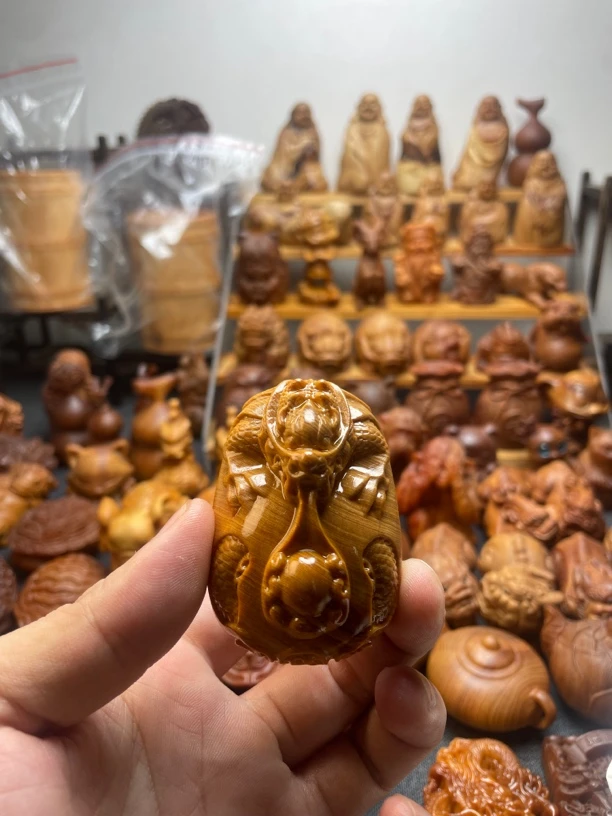 崖柏陈化料龙吐珠牌子