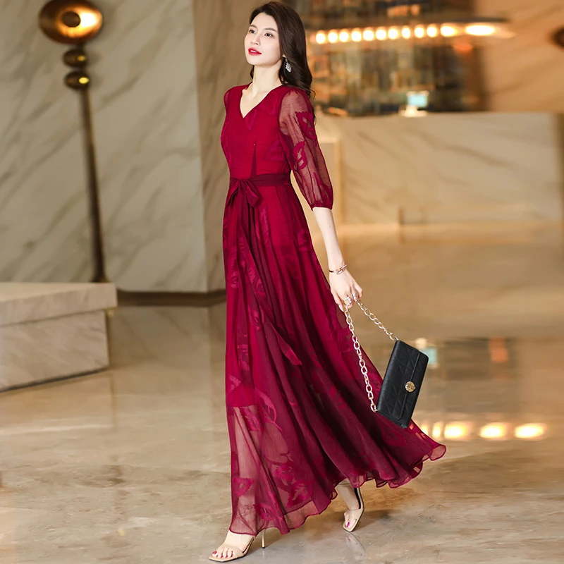 2025新款春夏V领大摆气质连衣裙收腰显瘦旅游度假长裙沙滩裙4013