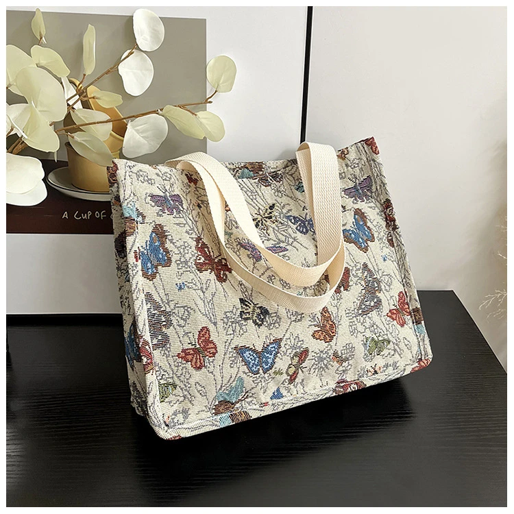 文艺刺绣手提单肩托特包时尚百搭化妆包溜娃袋母婴包学生通勤包Q