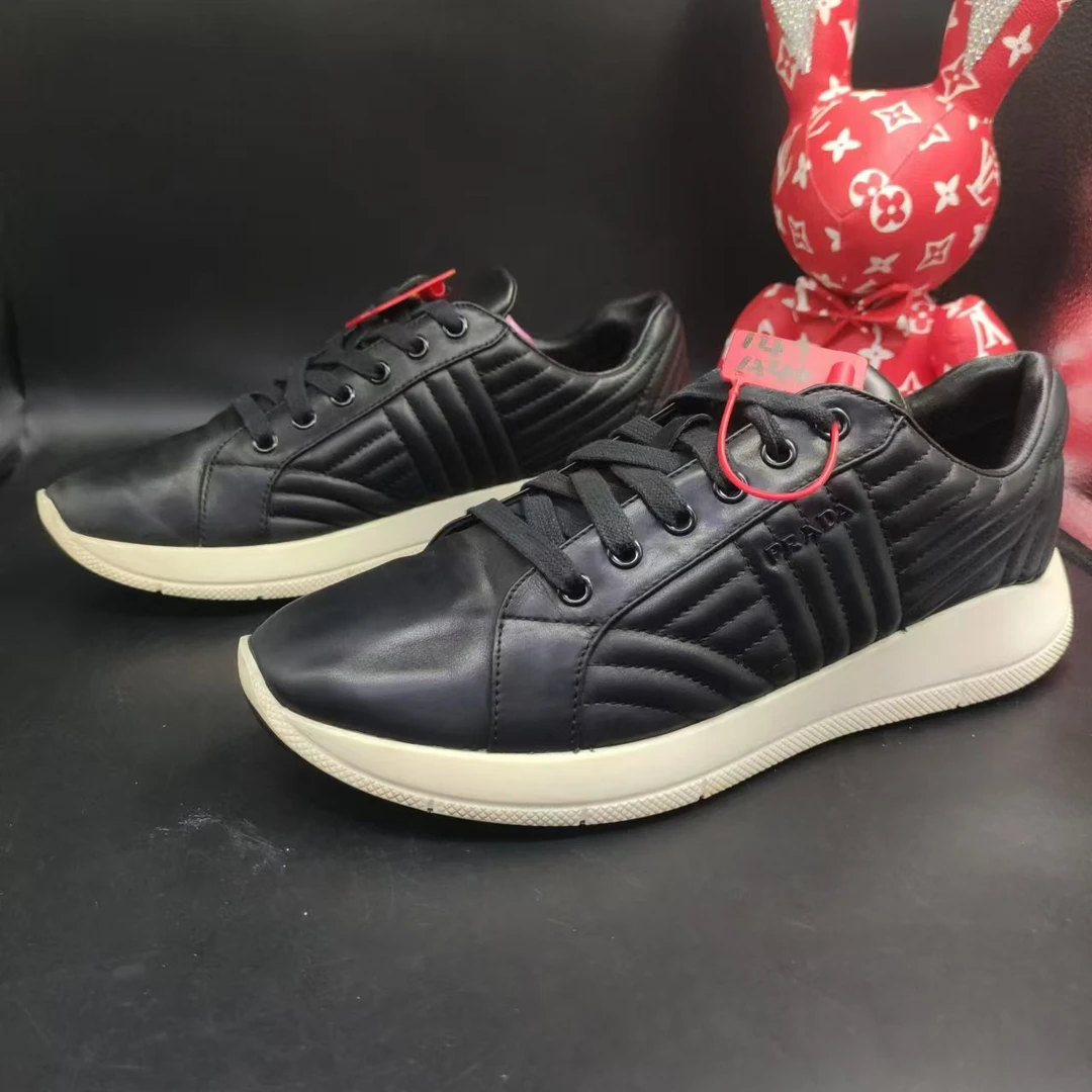 【AO折扣】Prada/普拉达 41欧码 男士休闲时尚黑色厚底系带板鞋147