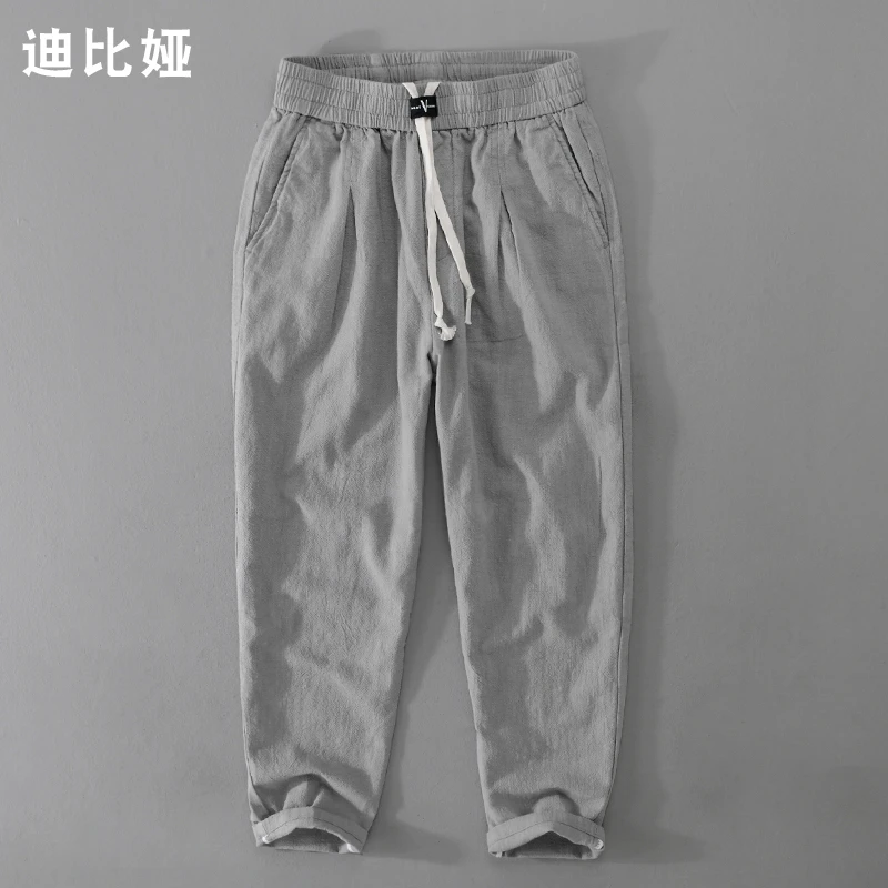 迪比娅夏季薄款休闲苎麻长裤宽松休闲透气百搭青年锥形麻料男裤Y