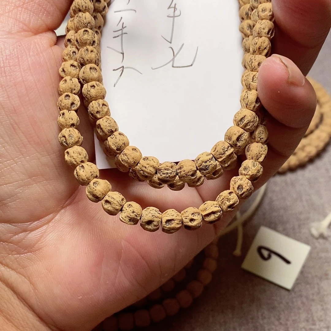柏香籽/百香籽吊坠左****七