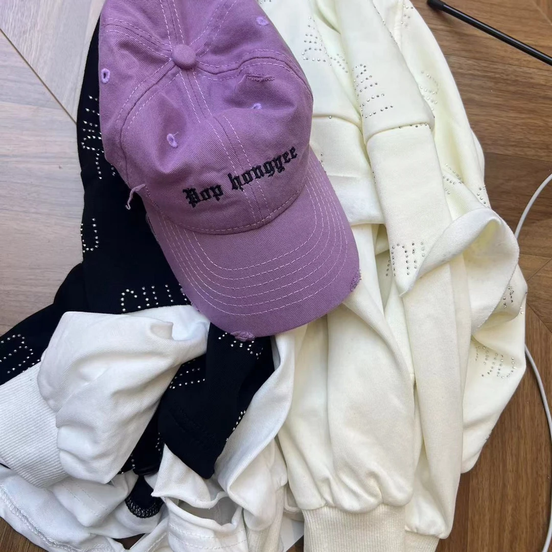 树2024【Y】4月13日 男童女童时尚黑色烫钻破洞卫衣4039-