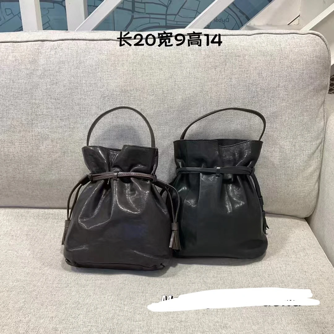 传小众设计重水洗头层植鞣牛皮抽绳水桶包斜挎真皮女包手提包
