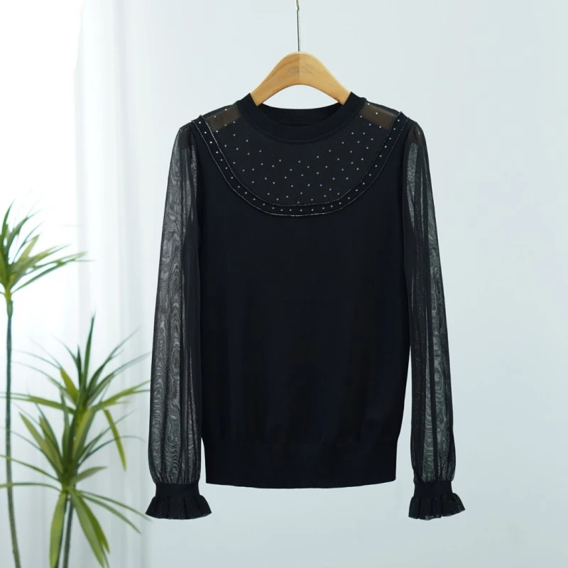 曼系列  E110  女装时尚撤柜长袖针织上衣黑色