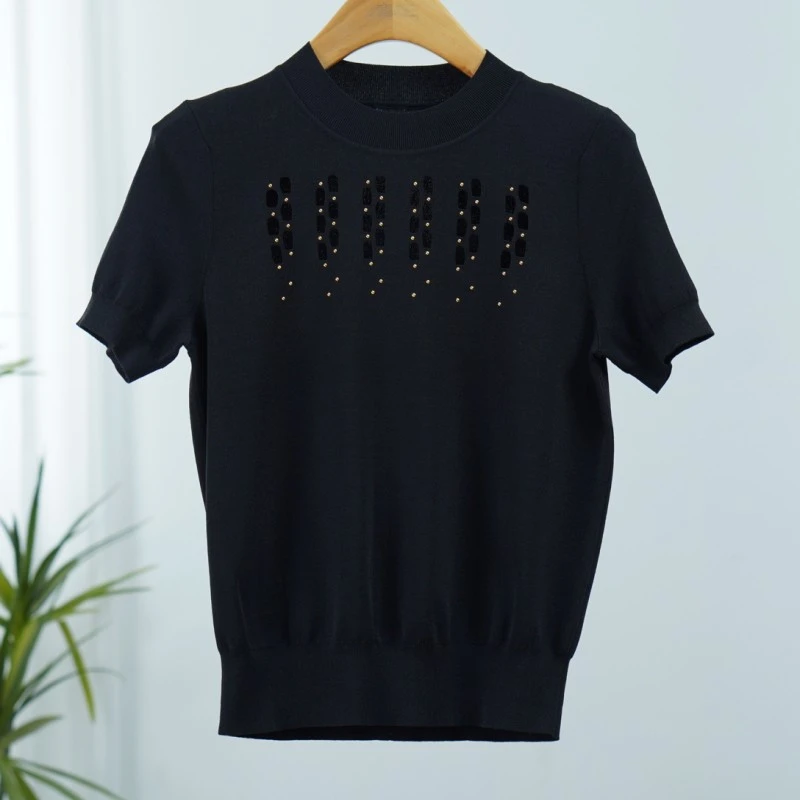 曼系列  Y012  女装时尚撤柜短袖针织衫黑色