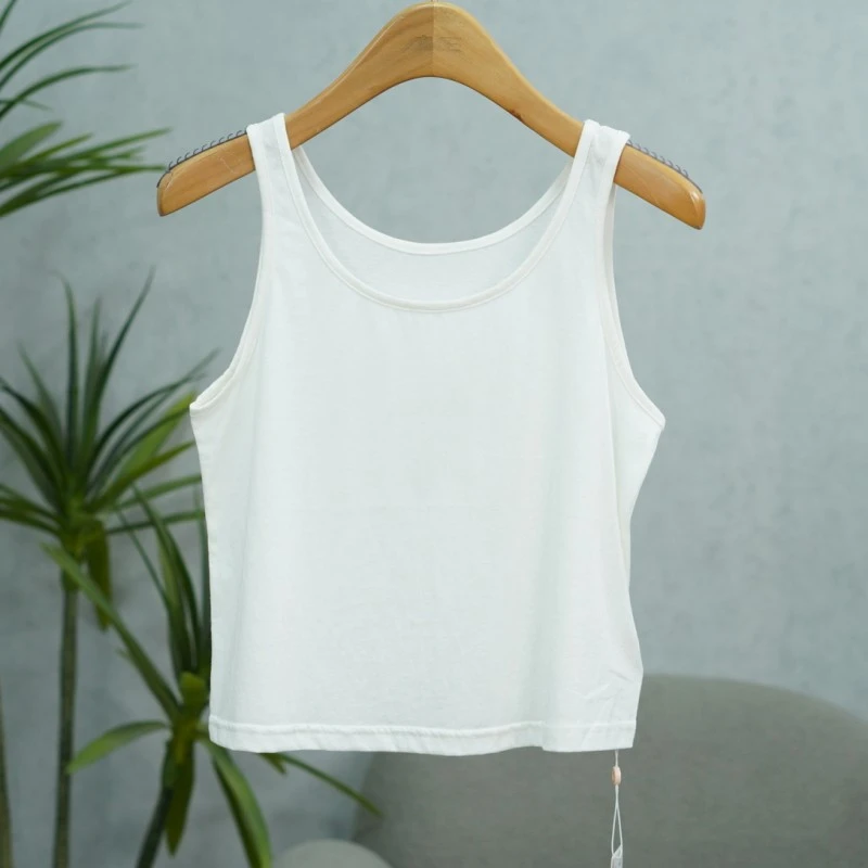 咏系列   Y599   女装时尚撤柜休闲打底背心米白JD99004