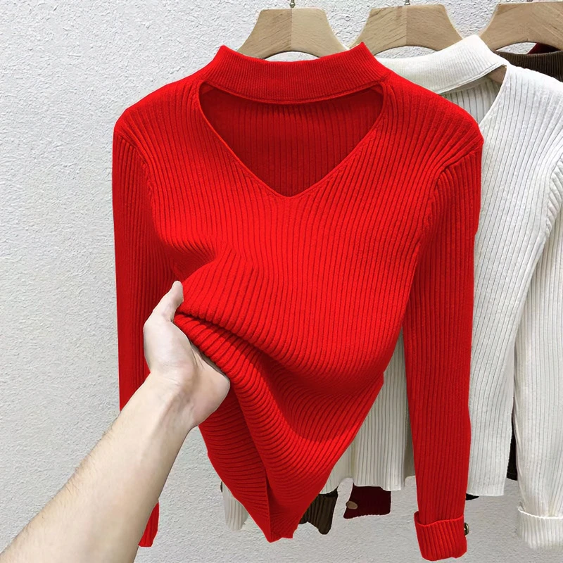 挂脖镂空毛衣女秋冬洋气2024新款设计感性感内搭半高领打底针织衫