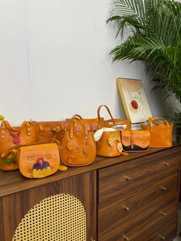 旗牛A201-300头层牛皮斜挎女包