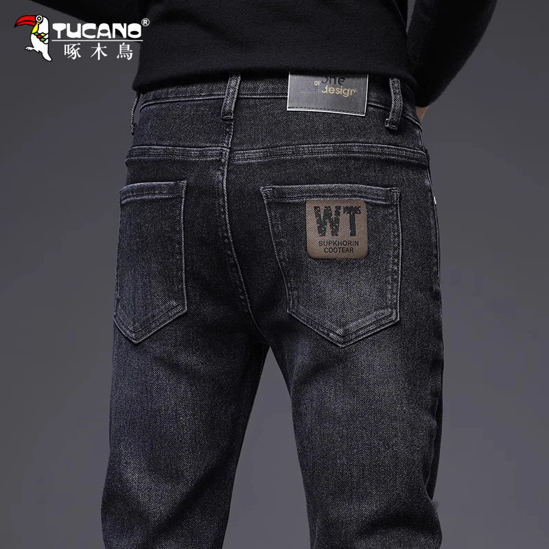 啄木鸟2025新款秋冬黑色牛仔裤男款修身小脚潮牌高端男款弹力长裤