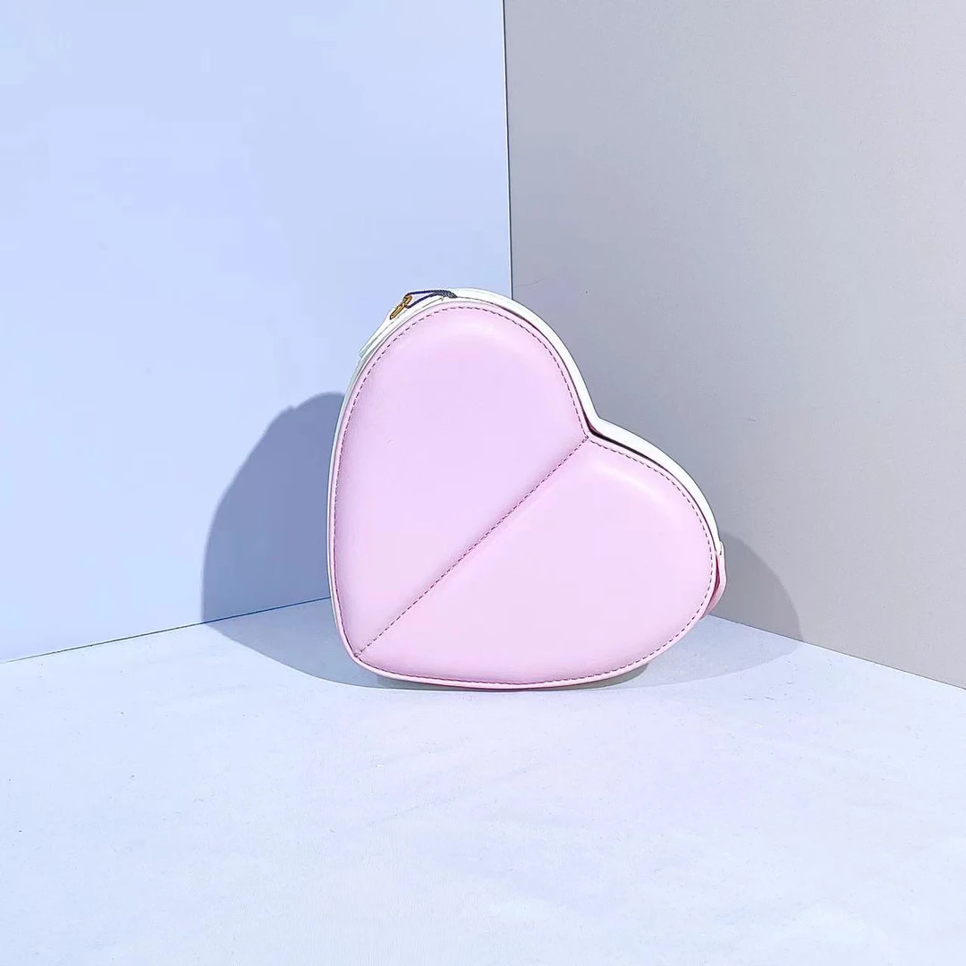 10701188白色S女士爱心单肩斜挎包-泉范