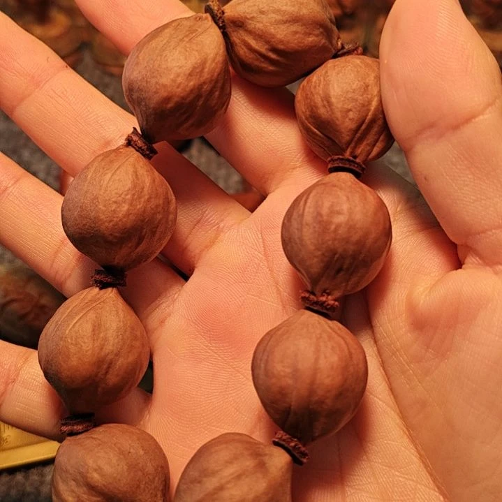 橄榄核核雕溜**道手串原皮素核橄榄