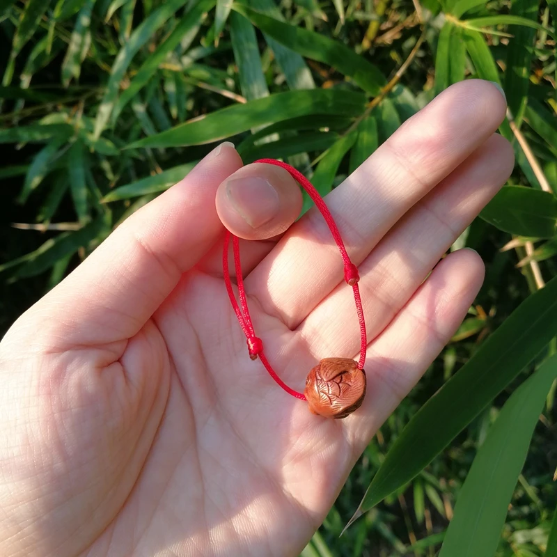 天然桃核手工雕刻鲤鱼荷花筐编织红绳儿童白天宝宝满月节礼物佩戴