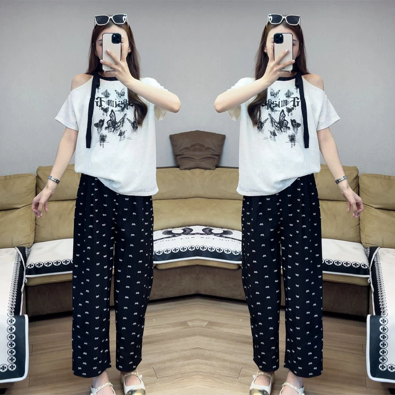 2024年时尚韩版宽松时尚挂脖潮妈设计感印花上衣T恤+花色黑裤子女