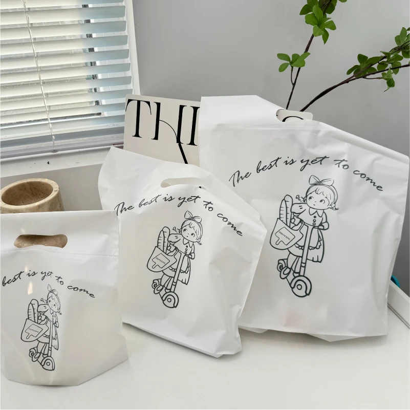 磨砂小女孩手提袋奶油黄色塑料挖孔袋加厚迷你袋子饰品内衣化妆品