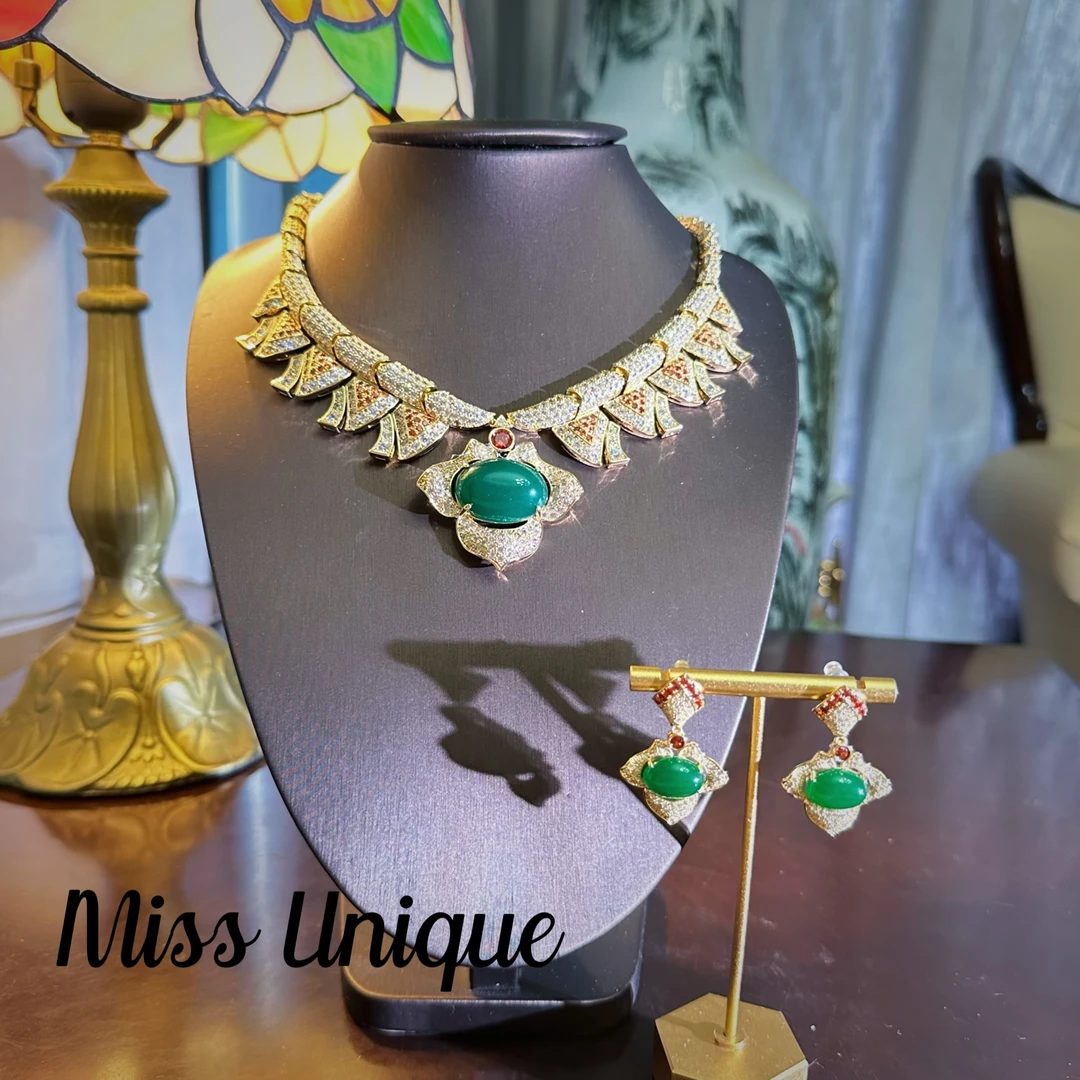 E8572宝家绿色椭圆三瓣花项链套装