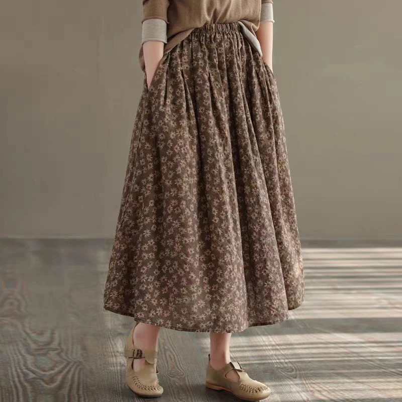 春夏新款棉麻文艺小雏菊碎花半身裙宽松百搭显瘦松紧腰A字大摆裙