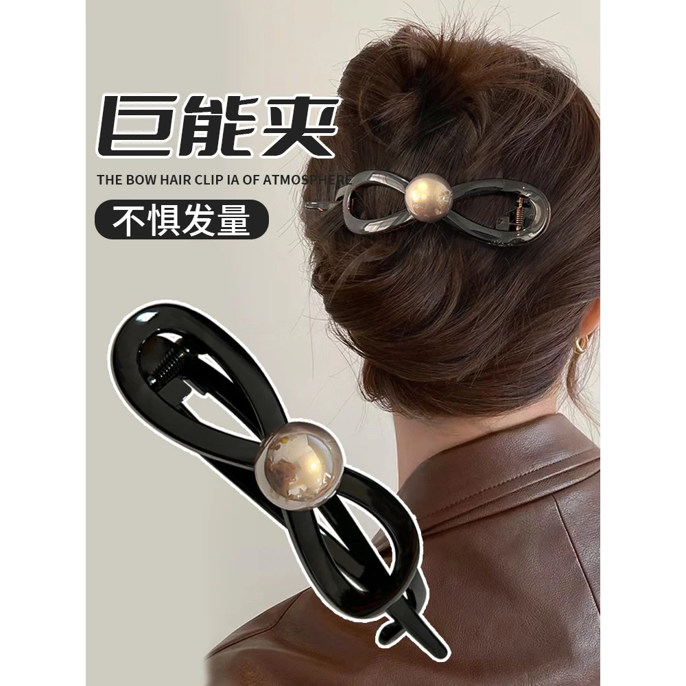 蝴蝶结气质珍珠一字抓夹女2024新款高级感扭扭发夹后脑勺鲨鱼夹子