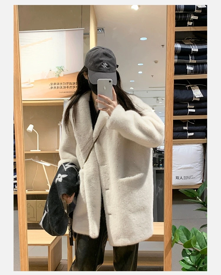 皮毛一体外套女冬季2025新款中长款宽松保暖气质上衣