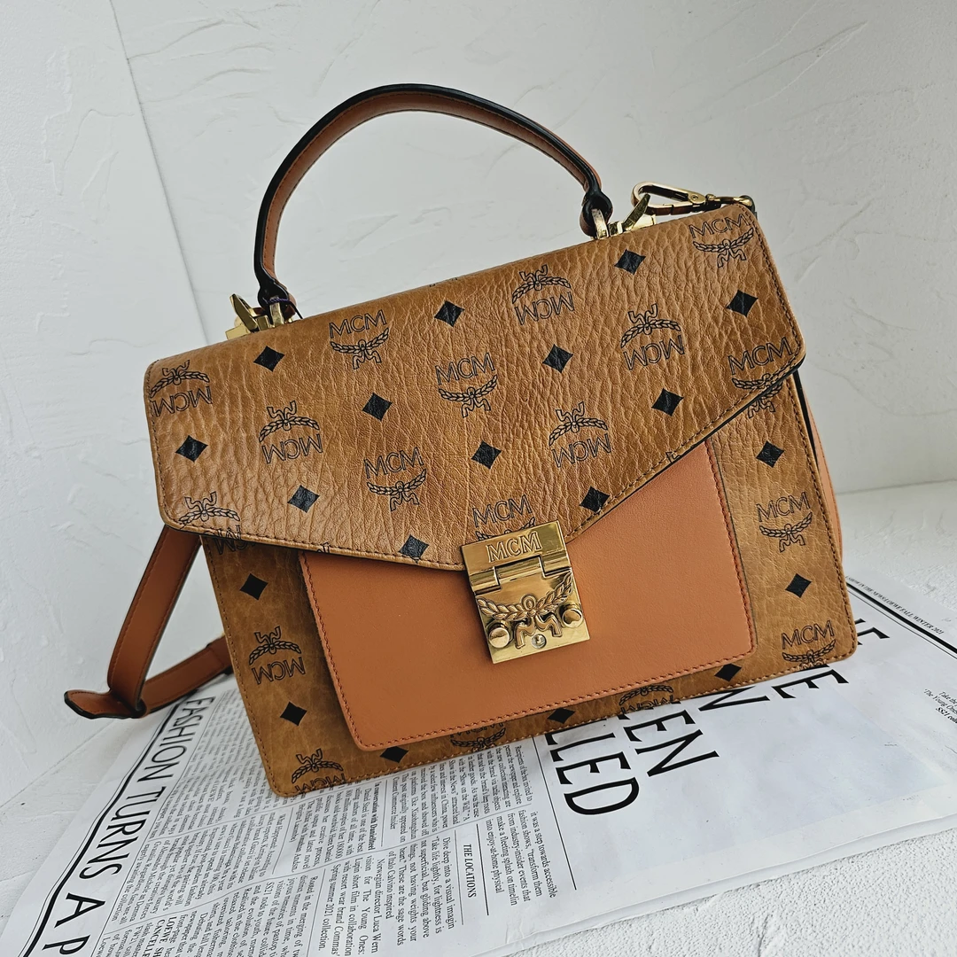 90新 MCM 干邑色老花风琴手提斜挎包/GG/9358720