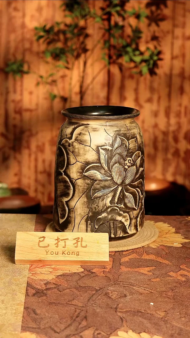 陶10-144高度27口径15已打孔